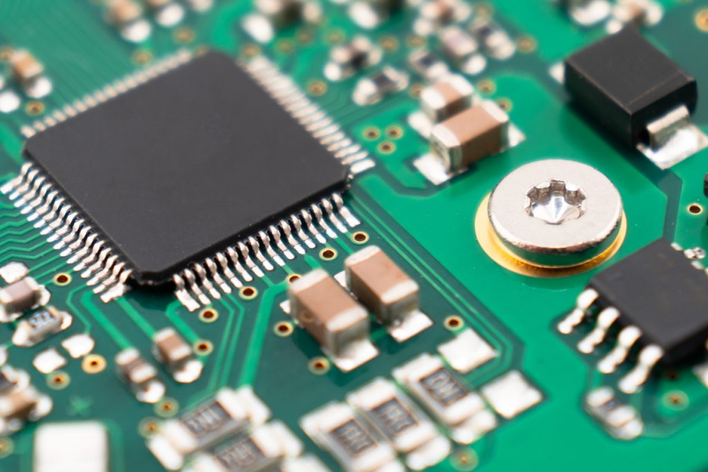 Closeup of a printed circuit board for automotive electronics services
