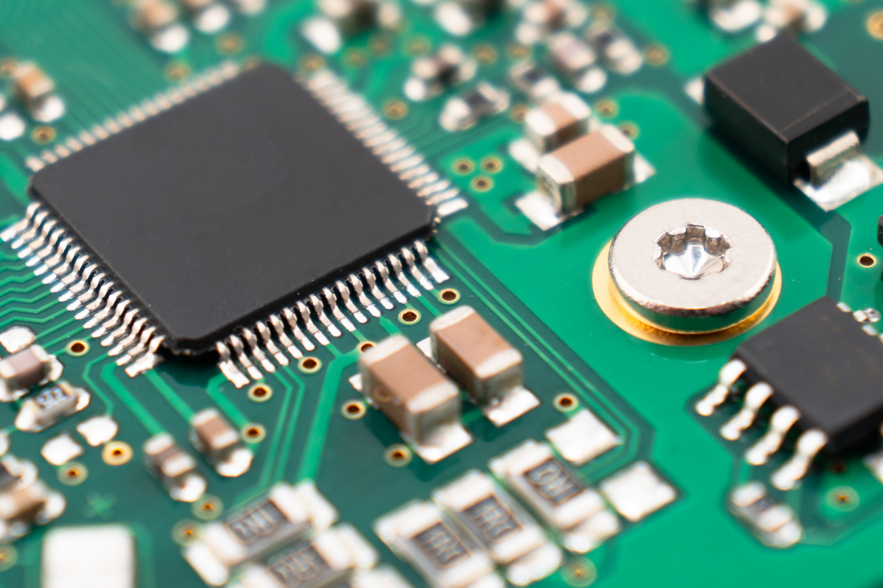 Closeup of a printed circuit board for automotive electronics services