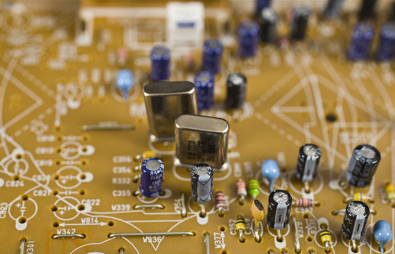 A closeup of types of circuit board components