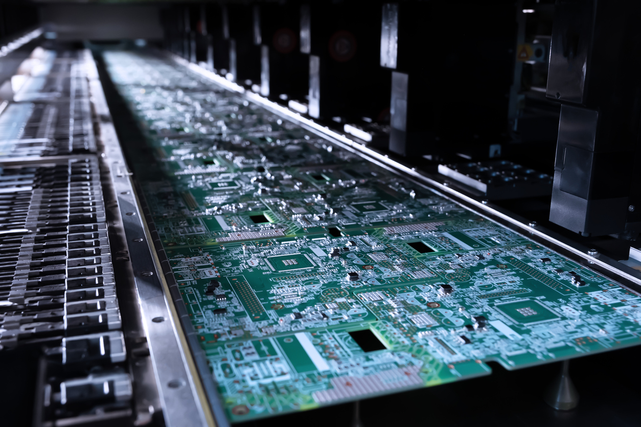 A closeup of the surface mount contract manufacturing process